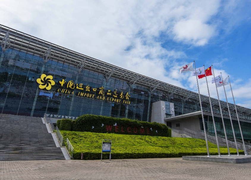 International business traveler in Guangzhou with luxury hotel and medical tourism concierge cues during Canton Fair 2026